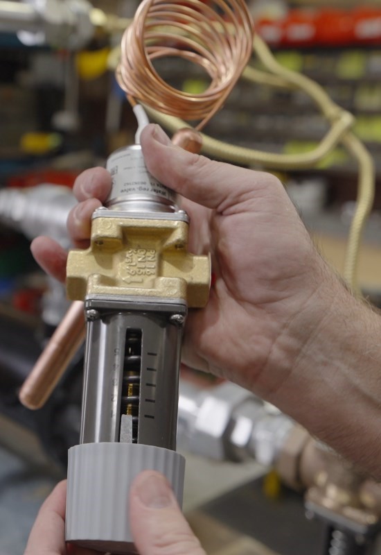 Water-modulating valve used to control oil temperature in a custom lube oil system